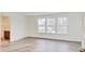 Spacious bedroom featuring luxury vinyl plank flooring and natural light at 3567 Windstar Ct, Columbus, IN 47203