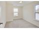 Cozy bedroom with carpet, natural light and a neutral color scheme at 3567 Windstar Ct, Columbus, IN 47203