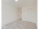 Carpeted bedroom with a double door closet and neutral walls at 3567 Windstar Ct, Columbus, IN 47203