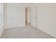 Well-lit bedroom featuring plush carpeting and neutral wall paint at 3567 Windstar Ct, Columbus, IN 47203