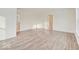 Inviting open-concept living room with hard surface flooring and bright lighting at 3567 Windstar Ct, Columbus, IN 47203