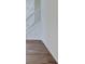 Elegant staircase with white railings and wood flooring, creating a bright and open feel at 3567 Windstar Ct, Columbus, IN 47203