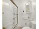 Bathroom featuring a toilet, shower over tub, and vanity at 1127 S Pershing Ave, Indianapolis, IN 46221
