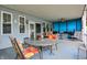 Back porch featuring patio furniture and decorations at 1127 S Pershing Ave, Indianapolis, IN 46221