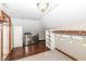 Attic laundry room with new washer and dryer and ample shelving space at 5826 Winding Way Ln, Indianapolis, IN 46220