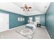 Large main bedroom featuring a vaulted ceiling, stylish fan, and a patterned area rug at 5826 Winding Way Ln, Indianapolis, IN 46220