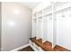 Mudroom with built-in storage lockers, a bench, and coat hooks at 5826 Winding Way Ln, Indianapolis, IN 46220