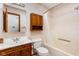Bathroom featuring a vanity with sink, medicine cabinet, toilet and shower/tub combination at 7655 Westerville Dr, Clayton, IN 46118