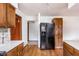 Spacious kitchen with modern appliances, wooden cabinets, and a functional layout at 7655 Westerville Dr, Clayton, IN 46118