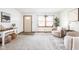 Open-concept living room with stylish decor, natural light, and a welcoming atmosphere at 7655 Westerville Dr, Clayton, IN 46118