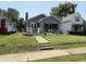A well-kept single-story home with a manicured lawn and sidewalk leading to the entrance at 2811 Fenwood Ave, Terre Haute, IN 47803