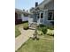 View of the front entrance with steps, a railing and an antique style street lamp at 2811 Fenwood Ave, Terre Haute, IN 47803