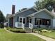 Charming single-story home with a well-maintained lawn and inviting front porch at 2811 Fenwood Ave, Terre Haute, IN 47803