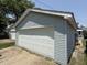 Close-up of the detached garage, highlighting its siding and access at 2811 Fenwood Ave, Terre Haute, IN 47803