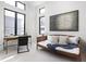 Bright bedroom featuring a modern desk and daybed beneath contemporary windows and a modern art piece at 1676 Solebar Way, Westfield, IN 46074