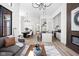 Open-concept living space featuring a stylish kitchen, dining area, and comfortable seating at 1676 Solebar Way, Westfield, IN 46074