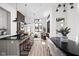 Open-concept living space with a stylish kitchen, cozy living room, and elegant dining area at 1676 Solebar Way, Westfield, IN 46074