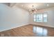 Inviting living room with hardwood floors, recessed lighting, and large window at 1229 N Keystone Ave, Indianapolis, IN 46201