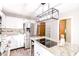 Modern kitchen featuring stainless steel appliances, granite countertops, and a center island at 10909 Wonderland Dr, Indianapolis, IN 46239