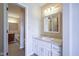 Bathroom with vanity, sink, and mirrored medicine cabinet at 4695 Shireton Ct, Indianapolis, IN 46254