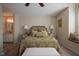 Comfortable bedroom showcases a plush bed, bedside tables, and window nook, offering a personal retreat at 4695 Shireton Ct, Indianapolis, IN 46254