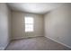 Simple bedroom with neutral walls and carpet at 4695 Shireton Ct, Indianapolis, IN 46254