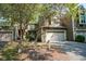 Charming home exterior with a well-manicured lawn and mature trees, providing curb appeal at 4695 Shireton Ct, Indianapolis, IN 46254