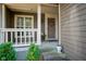 Close-up of a charming front door with decorative wreath, enhancing the home's curb appeal at 4695 Shireton Ct, Indianapolis, IN 46254
