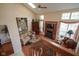 Spacious living room with fireplace, high ceilings, and abundant natural light at 4695 Shireton Ct, Indianapolis, IN 46254