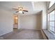 Living room with window seat and view into bathroom at 4695 Shireton Ct, Indianapolis, IN 46254