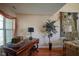 Inviting home office with rich wood desk, accent lamps, and elegant decor for a productive workspace at 4695 Shireton Ct, Indianapolis, IN 46254