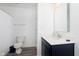 Fresh bathroom with a sleek vanity, a large mirror, modern lighting, and a pristine shower curtain at 1130 Cobra Dr, Franklin, IN 46131