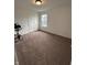 Cozy carpeted bedroom bathed in natural light from the window; a peaceful and inviting space at 1130 Cobra Dr, Franklin, IN 46131
