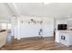 Open-concept kitchen featuring a center island with seating, gray cabinets, and modern appliances at 1130 Cobra Dr, Franklin, IN 46131