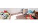 Bright storage area showing boxes, totes, and furniture; perfect for organization in the household at 1130 Cobra Dr, Franklin, IN 46131