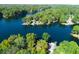 Aerial view of lakefront homes and lush greenery at 7438 Haw Dr, Nineveh, IN 46164