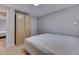 Basement bedroom with a king-size bed and built-in wooden cabinets at 7438 Haw Dr, Nineveh, IN 46164