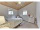 Charming bedroom featuring a floral bedspread and a white wicker dresser at 7438 Haw Dr, Nineveh, IN 46164