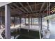 Covered boat lift; relaxing under the deck at 7438 Haw Dr, Nineveh, IN 46164