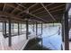 Covered boat lift with lake views at 7438 Haw Dr, Nineveh, IN 46164