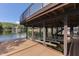 Covered boat lift with additional deck space at 7438 Haw Dr, Nineveh, IN 46164