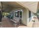 Relaxing covered deck with swing and seating area at 7438 Haw Dr, Nineveh, IN 46164