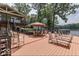Spacious deck with lounge chairs and dining area, ideal for entertaining at 7438 Haw Dr, Nineveh, IN 46164