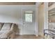 White door with window light leading to backyard from living room at 7438 Haw Dr, Nineveh, IN 46164