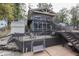 Lakefront home with deck, patio, and swing at 7438 Haw Dr, Nineveh, IN 46164