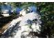 Aerial view showing house with a two-car garage and driveway at 7438 Haw Dr, Nineveh, IN 46164