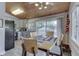 Eat-in kitchen with gray cabinets, granite counters, and stainless steel appliances at 7438 Haw Dr, Nineveh, IN 46164