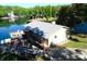 Lake house with large deck and patio area with lake access at 7438 Haw Dr, Nineveh, IN 46164