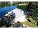 Aerial view of lake house with deck, dock and beautiful lake view at 7438 Haw Dr, Nineveh, IN 46164
