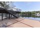 Spacious lakefront dock with multiple levels and seating, perfect for relaxation at 7438 Haw Dr, Nineveh, IN 46164